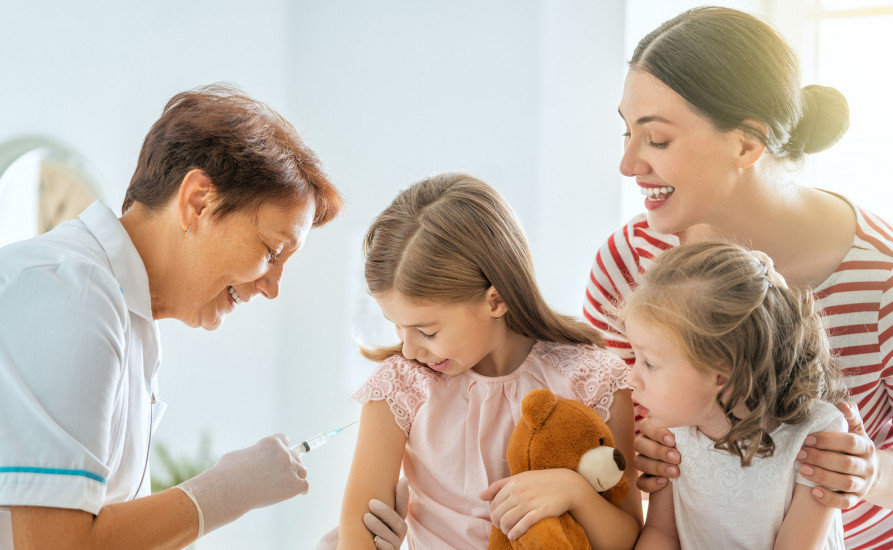 Young family - Little girl getting vaccinated